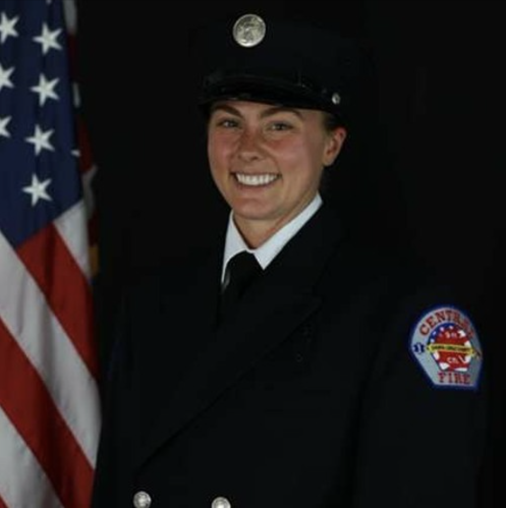 Kayla Baumgardner wearing Firefighter uniform