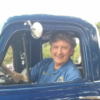 Tim Piumarta in a blue truck